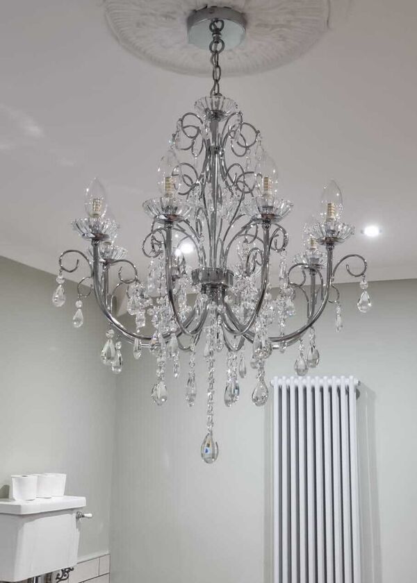 After photos - Luxurious bathroom with elegant chandelier