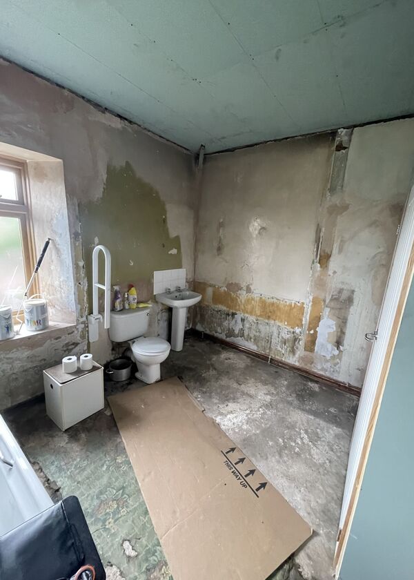 Before photo - Large bathroom space in need of a work